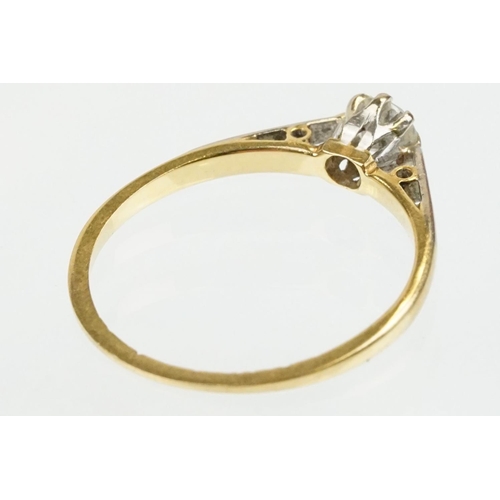 46 - 18ct gold and platinum diamond solitaire ring. The ring being set with a round brilliant cut diamond... 