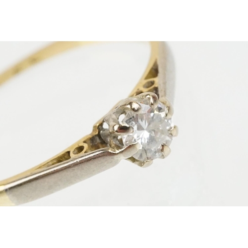 46 - 18ct gold and platinum diamond solitaire ring. The ring being set with a round brilliant cut diamond... 