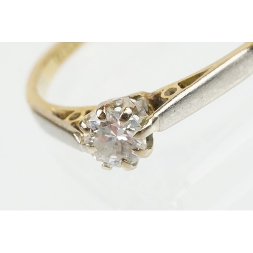 46 - 18ct gold and platinum diamond solitaire ring. The ring being set with a round brilliant cut diamond... 