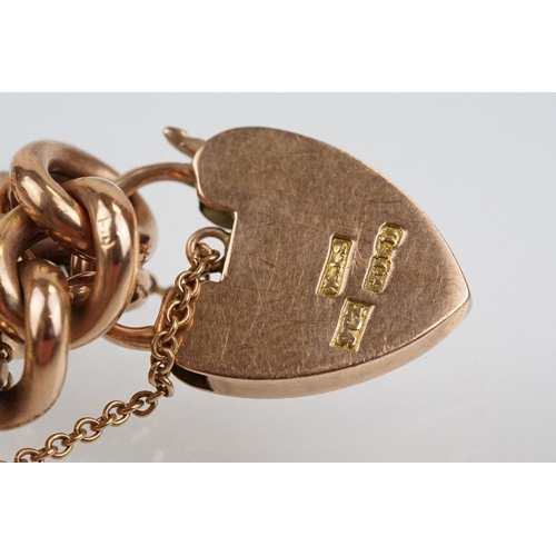 49 - Early 20th Century 9ct gold curb link bracelet having a heart padlock clasp. Lock marked 9ct gold, e... 