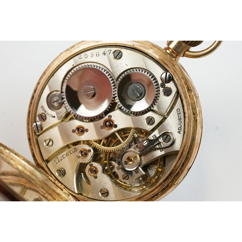 496 - Hallmarked 9ct gold open face pocket watch having a white enamelled dial with arabic numerals to the... 