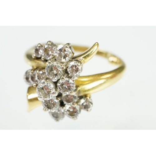 5 - Mid Century Vintage yellow gold and diamond crossover cluster ring being set with fifteen round bril... 