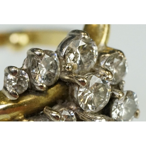 5 - Mid Century Vintage yellow gold and diamond crossover cluster ring being set with fifteen round bril... 