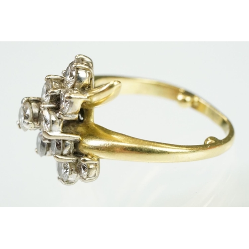 5 - Mid Century Vintage yellow gold and diamond crossover cluster ring being set with fifteen round bril... 