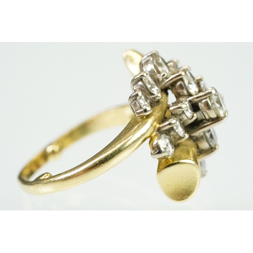 5 - Mid Century Vintage yellow gold and diamond crossover cluster ring being set with fifteen round bril... 