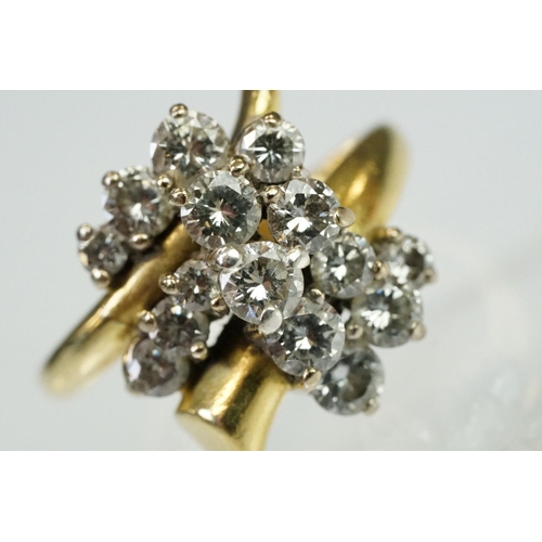 5 - Mid Century Vintage yellow gold and diamond crossover cluster ring being set with fifteen round bril... 