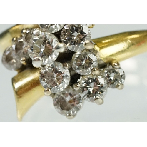 5 - Mid Century Vintage yellow gold and diamond crossover cluster ring being set with fifteen round bril... 