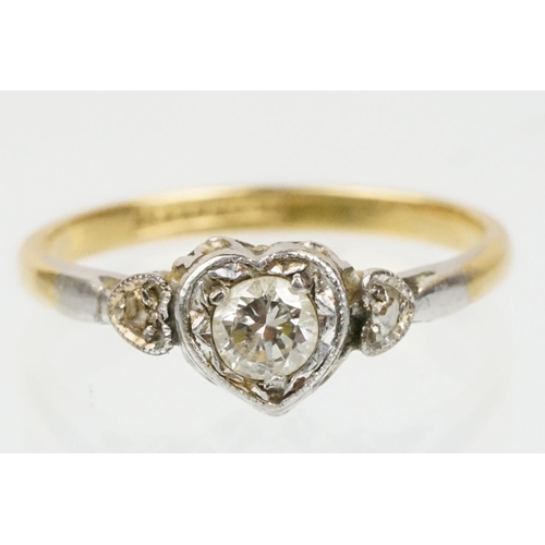 50 - 18ct gold diamond solitaire ring. The ring being set with a round brilliant cut diamond set within a... 