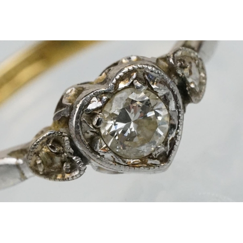 50 - 18ct gold diamond solitaire ring. The ring being set with a round brilliant cut diamond set within a... 