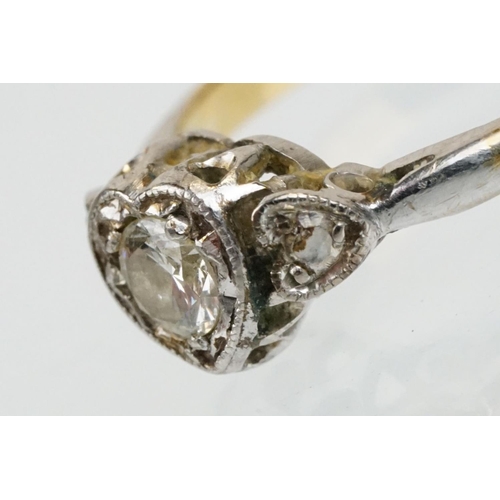 50 - 18ct gold diamond solitaire ring. The ring being set with a round brilliant cut diamond set within a... 