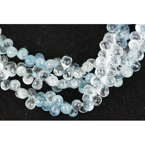 58 - Triple strand aquamarine beaded necklace, each thread with faceted aquamarine drops with forget me k... 