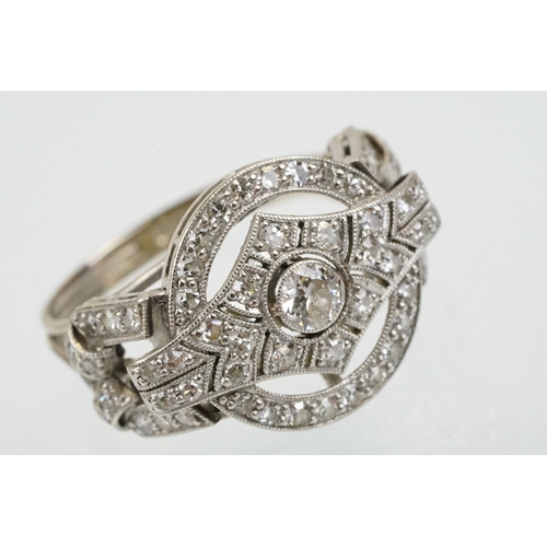 6 - Art Deco 18ct white gold and platinum diamond panel ring being set with a round brilliant cut diamon... 