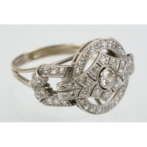 6 - Art Deco 18ct white gold and platinum diamond panel ring being set with a round brilliant cut diamon... 