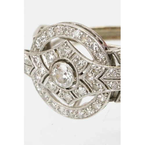 6 - Art Deco 18ct white gold and platinum diamond panel ring being set with a round brilliant cut diamon... 