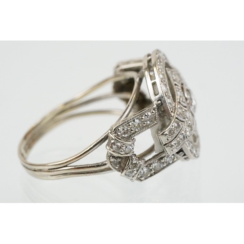 6 - Art Deco 18ct white gold and platinum diamond panel ring being set with a round brilliant cut diamon... 