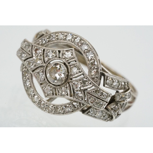 6 - Art Deco 18ct white gold and platinum diamond panel ring being set with a round brilliant cut diamon... 