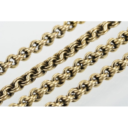 71 - 19th Century Victorian long guard chain having a rose gold spring ring clasp. Chain marked 15ct. Cha... 