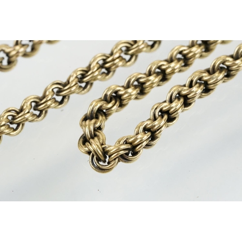 71 - 19th Century Victorian long guard chain having a rose gold spring ring clasp. Chain marked 15ct. Cha... 