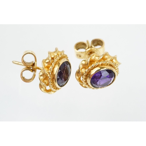 79 - Two pairs of 9ct gold stone set stud earrings to include a pair of ruby and diamond cluster earrings... 