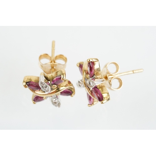 79 - Two pairs of 9ct gold stone set stud earrings to include a pair of ruby and diamond cluster earrings... 