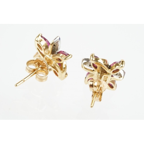 79 - Two pairs of 9ct gold stone set stud earrings to include a pair of ruby and diamond cluster earrings... 