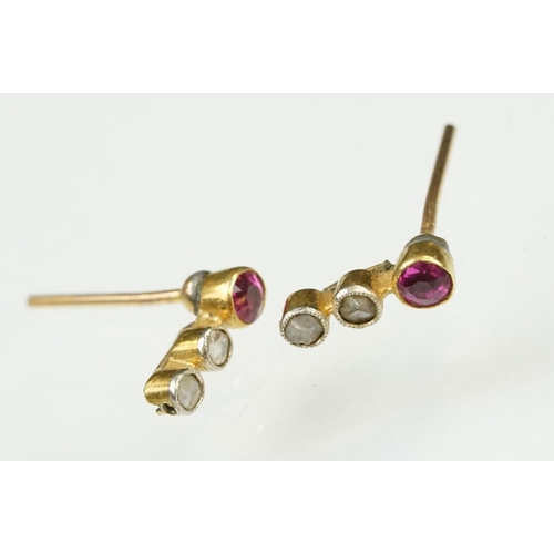 82 - Two pairs of gold earrings to include a pair of ruby and diamond three stone stud earrings (stud ear... 