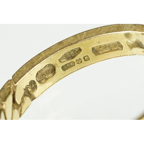 87 - 18ct gold and diamond band ring. The ring being set with five round cut diamonds with curb link deta... 