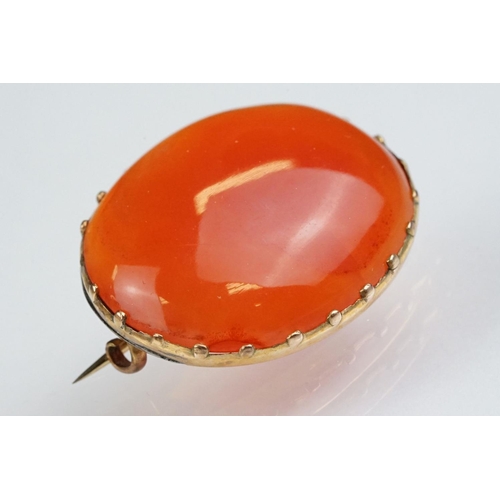 89 - 19th Century Victorian carnelian cabochon brooch together with a hallmarked 9ct gold fine link chain... 