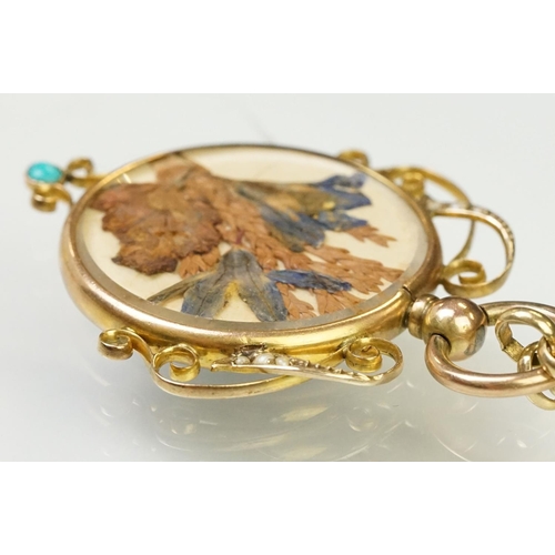 91 - Early 20th Century Edwardian photo locket having a round glazed photo panel having scrolled details ... 