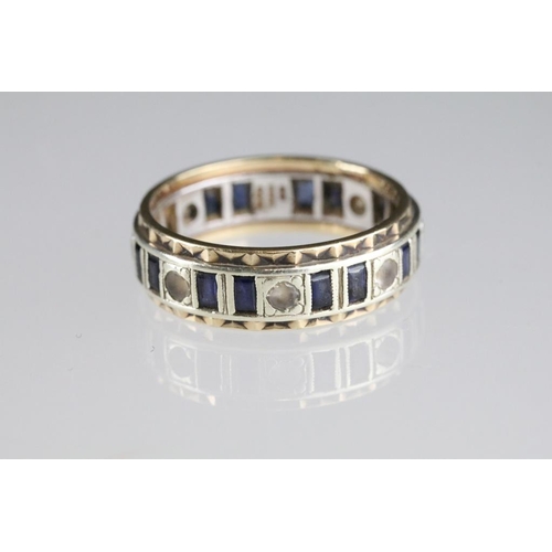 250A - Two 20th Century eternity rings to include one 9ct gold example set with blue and white stones (hall... 