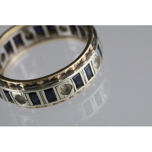 250A - Two 20th Century eternity rings to include one 9ct gold example set with blue and white stones (hall... 