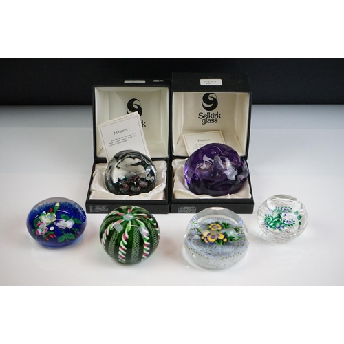 64 - Six glass paperweights to include a John Deacons faceted lamp work pansy & millefiori paperweight (w... 
