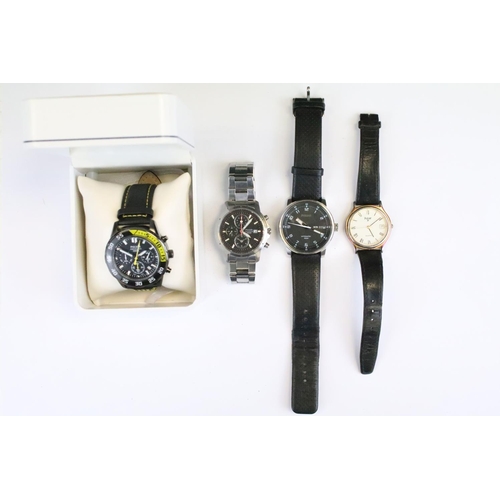 400 - A collection of four gents contemporary Pulsar wristwatches to include two Chronograph examples.