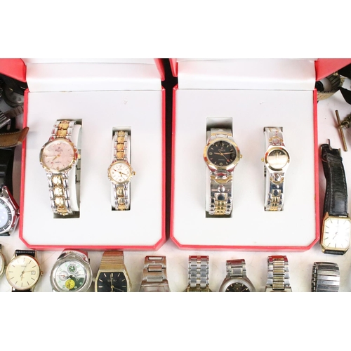 409 - A large collection of vintage and contemporary mechanical and quartz wristwatches to include Accuris... 