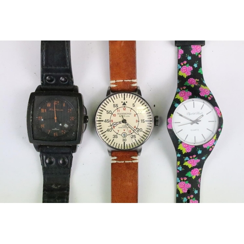 418 - A collection of twenty five mainly contemporary quartz ladies and gents wristwatches to include anal... 