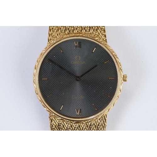 456 - A gents Omega DeVille quartz wristwatch on original fitted gold plated strap with Omega logo to clas... 