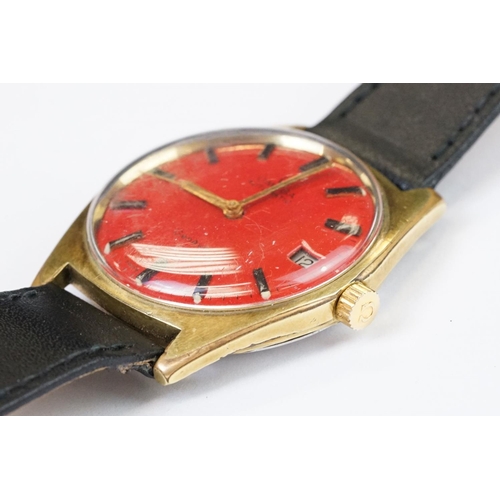 459 - A Vintage gents Omega Geneve automatic wristwatch, red dial, date function to 3 o'clock, Omega logo ... 