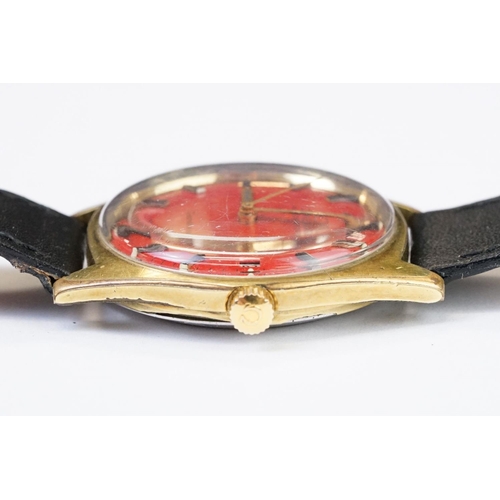 459 - A Vintage gents Omega Geneve automatic wristwatch, red dial, date function to 3 o'clock, Omega logo ... 