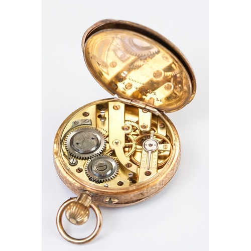 463 - An antique 14ct gold cased top winding fob watch, roman numeral markers with golden dial, clean cart... 