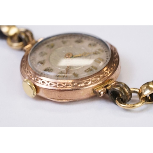 466 - A 1930's fully hallmarked ladies Marvin 9ct gold cased wristwatch with Silvered dial, mounted to bla... 