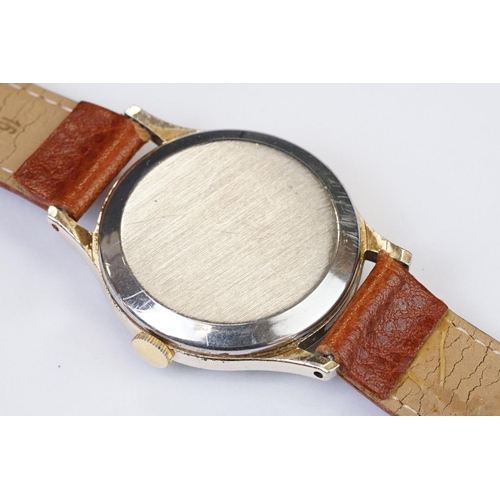 469 - A Vintage gents Tissot wristwatch, numerical markers with sub second hand to 6 o'clock, mounted to b... 