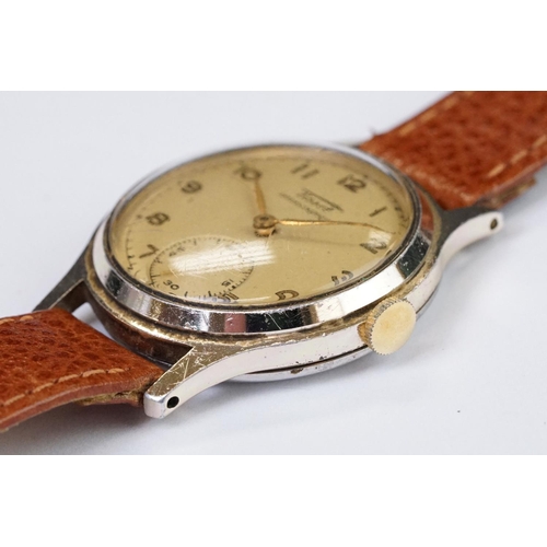 469 - A Vintage gents Tissot wristwatch, numerical markers with sub second hand to 6 o'clock, mounted to b... 