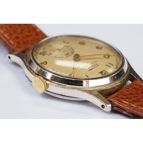 469 - A Vintage gents Tissot wristwatch, numerical markers with sub second hand to 6 o'clock, mounted to b... 