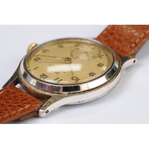 469 - A Vintage gents Tissot wristwatch, numerical markers with sub second hand to 6 o'clock, mounted to b... 