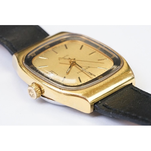 475 - A vintage gents Zenith quartz wristwatch, date function to 3 o'clock, baton markers with central sec... 