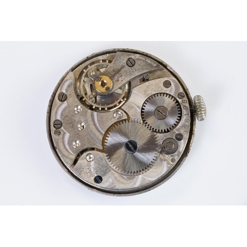 483 - An early 20th century military style trench watch, white enamel dial with numerical hour markers, mo... 