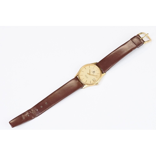 484 - A Tissot Seastar quartz wristwatch, baton markers with date function to 3 o'clock, mounted to brown ... 