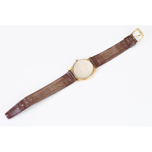 484 - A Tissot Seastar quartz wristwatch, baton markers with date function to 3 o'clock, mounted to brown ... 