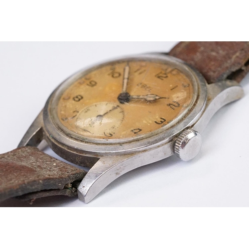 485 - A British military issued World War Two Ebel A.T.P wristwatch, sub second hand to 6 o'clock, numbere... 