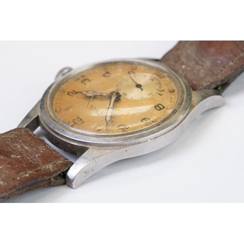 485 - A British military issued World War Two Ebel A.T.P wristwatch, sub second hand to 6 o'clock, numbere... 